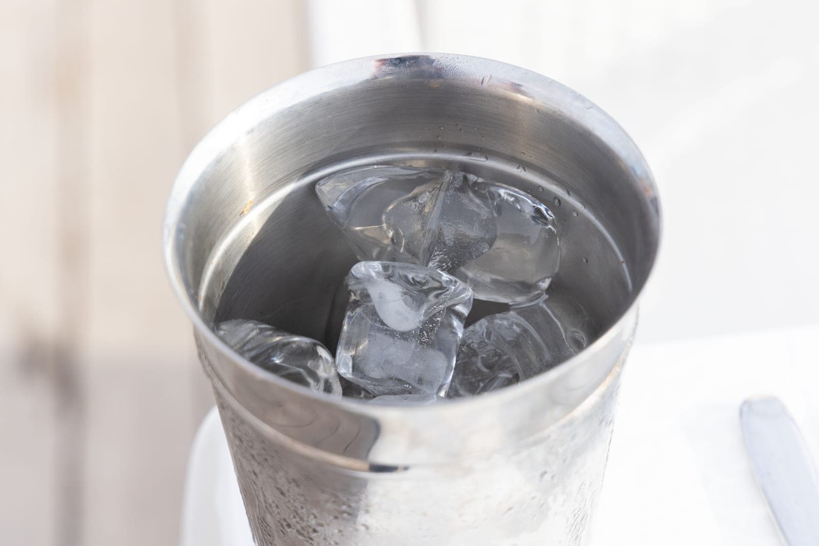 Ice cubes floating in cold water