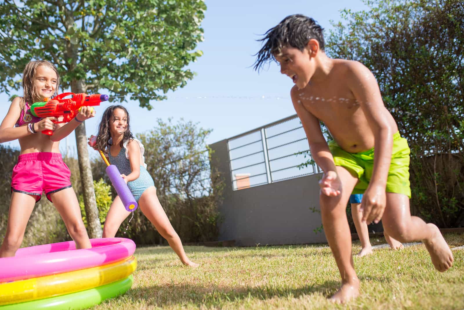 An inflatable tub filled with cold water on a patio