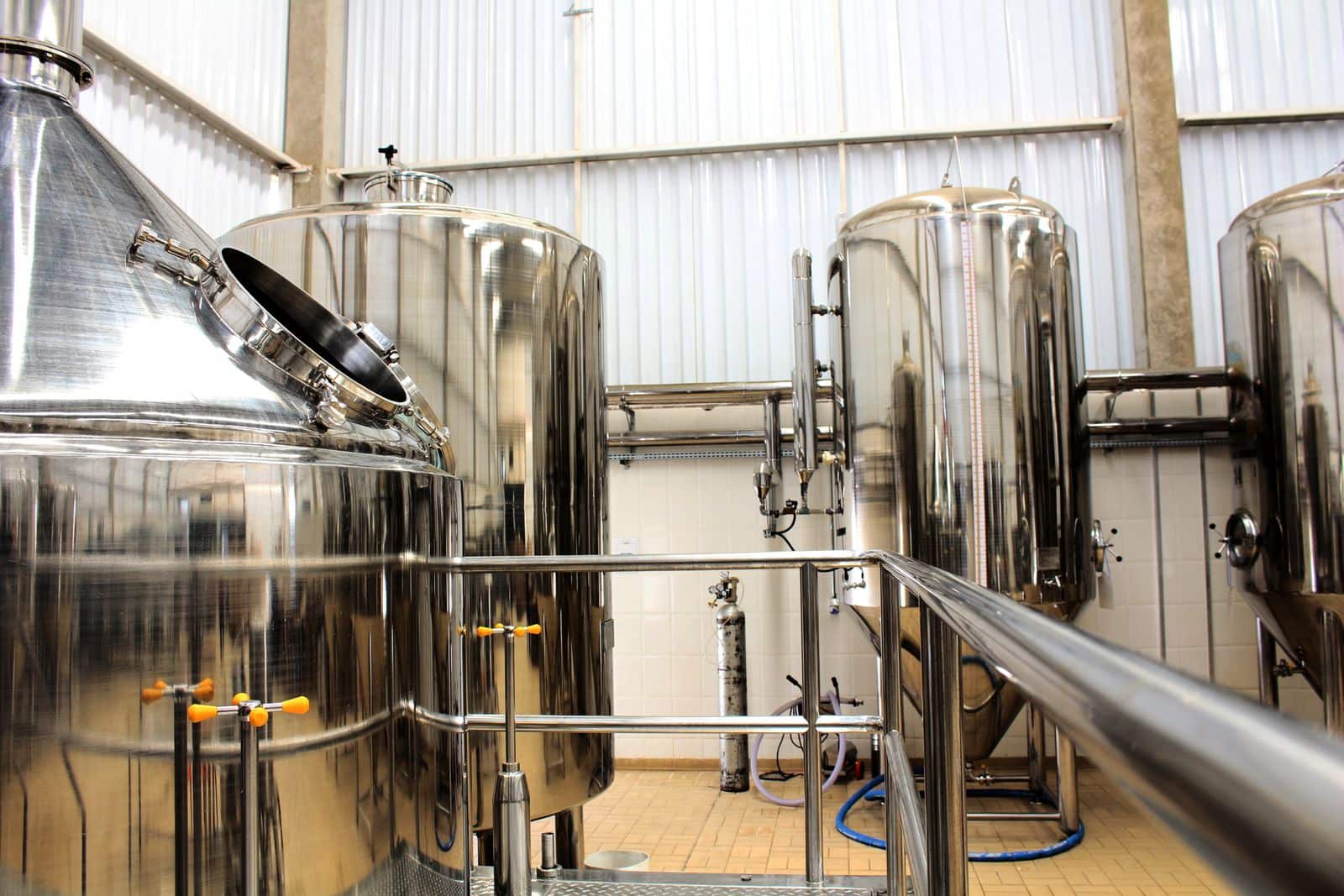 Stainless steel tanks in an industrial room