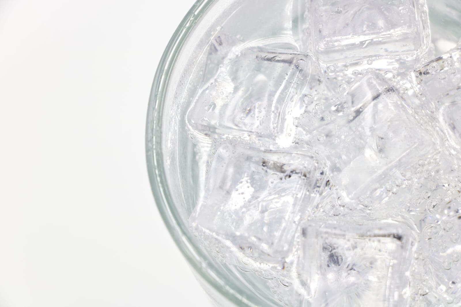 Cold water with ice cubes at the surface