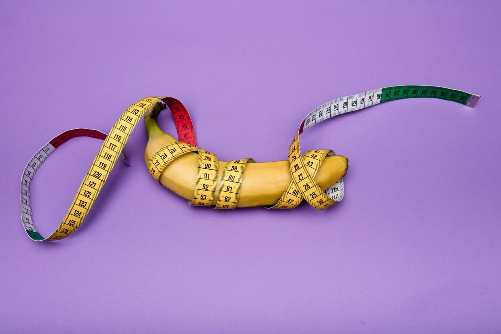 A tape measure extended across a flat surface